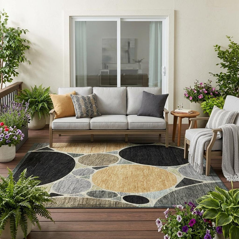 Geometric area rug with abstract circle and dot motif in black, gray, and tan