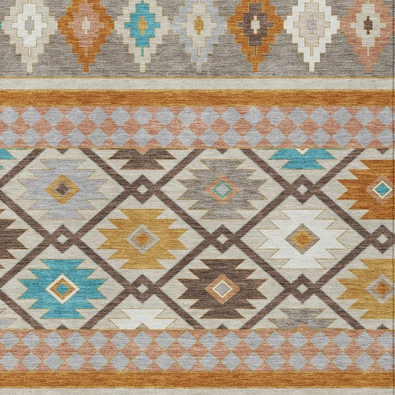 Southwestern washable area rug pattern view with gray, beige, orange, and blue diamond motifs