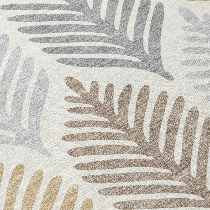 Close-up of ivory rug with beige and gray stacked leaf pattern in textured print