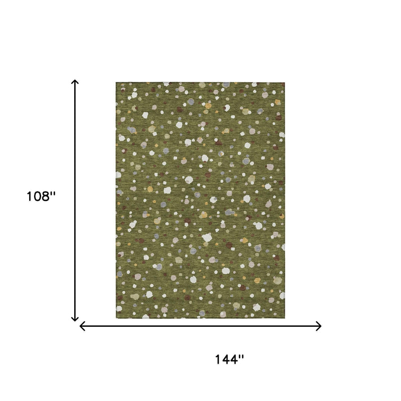 Olive green area rug, 108 x 144 in, with scattered white geometric spots and flecks