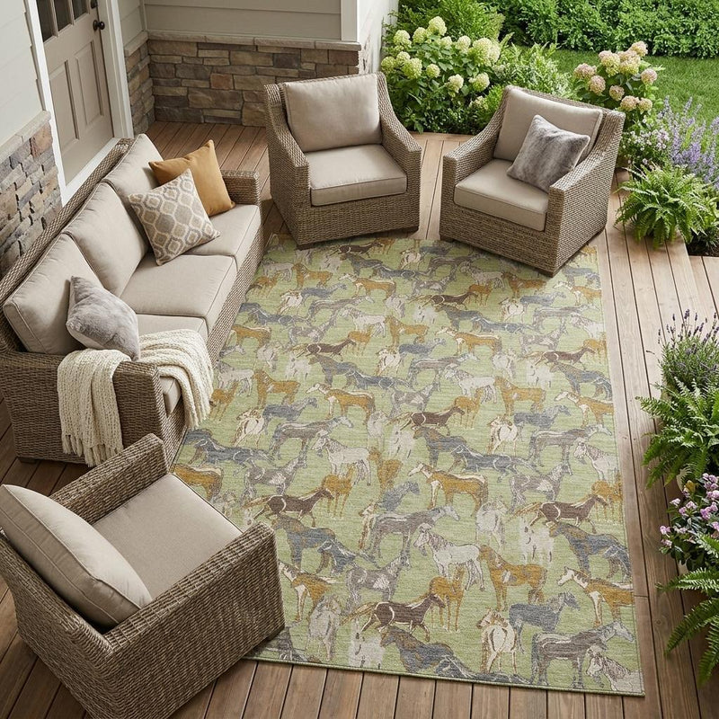 Horse print area rug in green, beige, gray, and tan, laid on outdoor patio