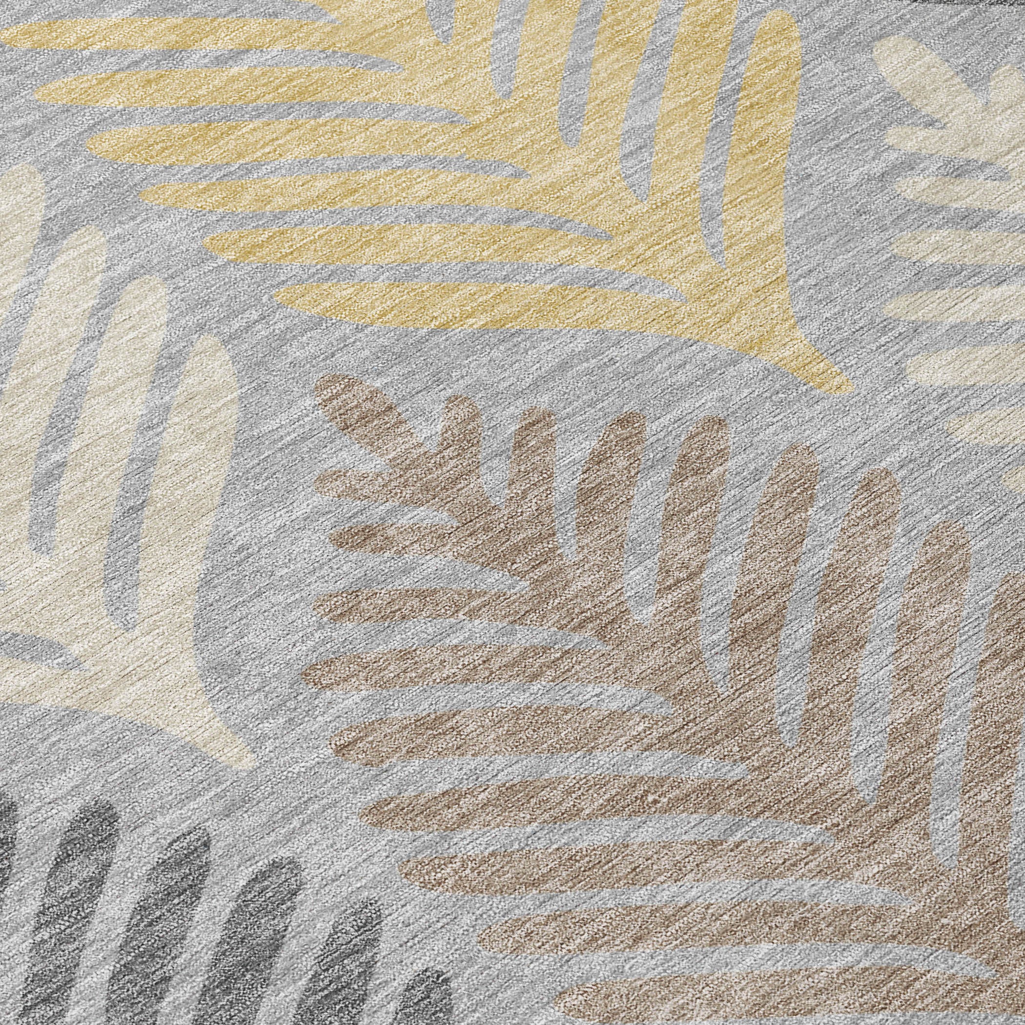 Fabric detail of gray and beige leaf pattern rug with subtle gold accents