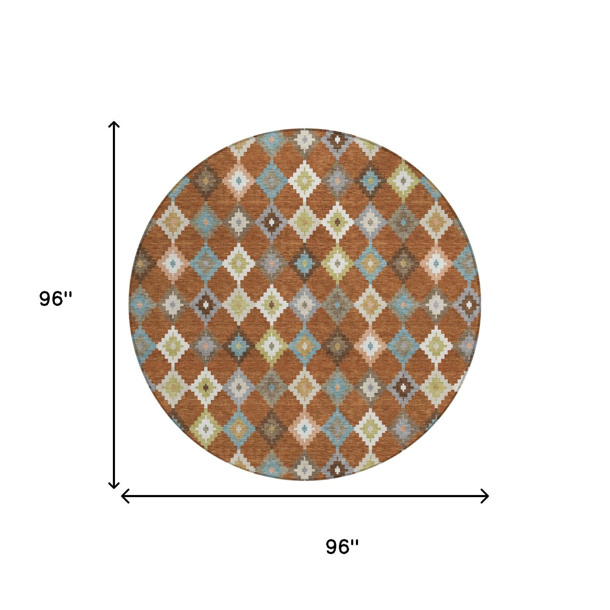 Round aztec area rug with orange-brown field and multicolor teal, gray, cream diamond accents