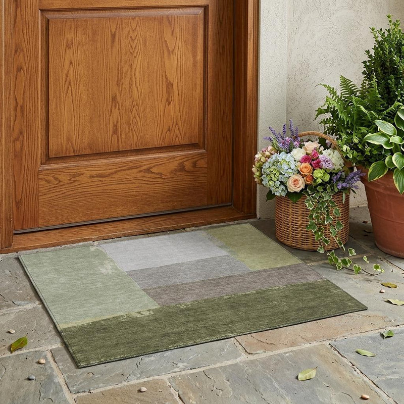 Geometric washable outdoor area rug with olive, fern, and gray blocks
