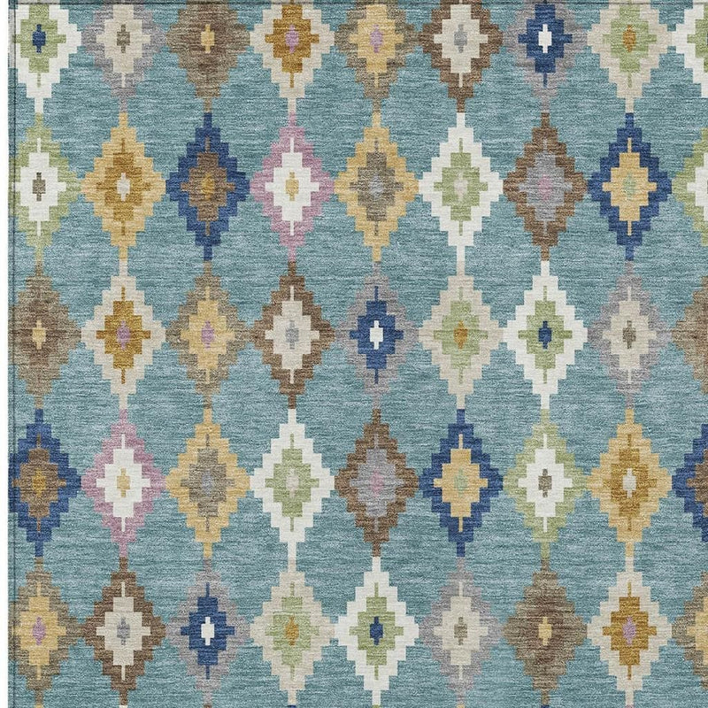 Close-up teal blue rug with multicolor diamond lattice pattern