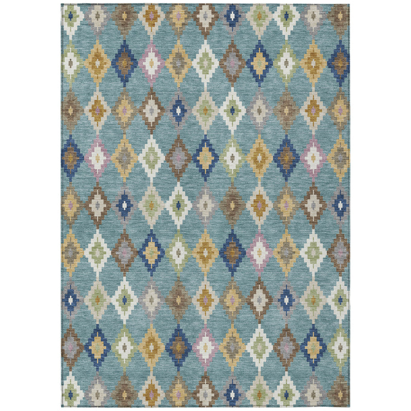 Teal blue area rug with repeating geometric diamond design in orange and blue