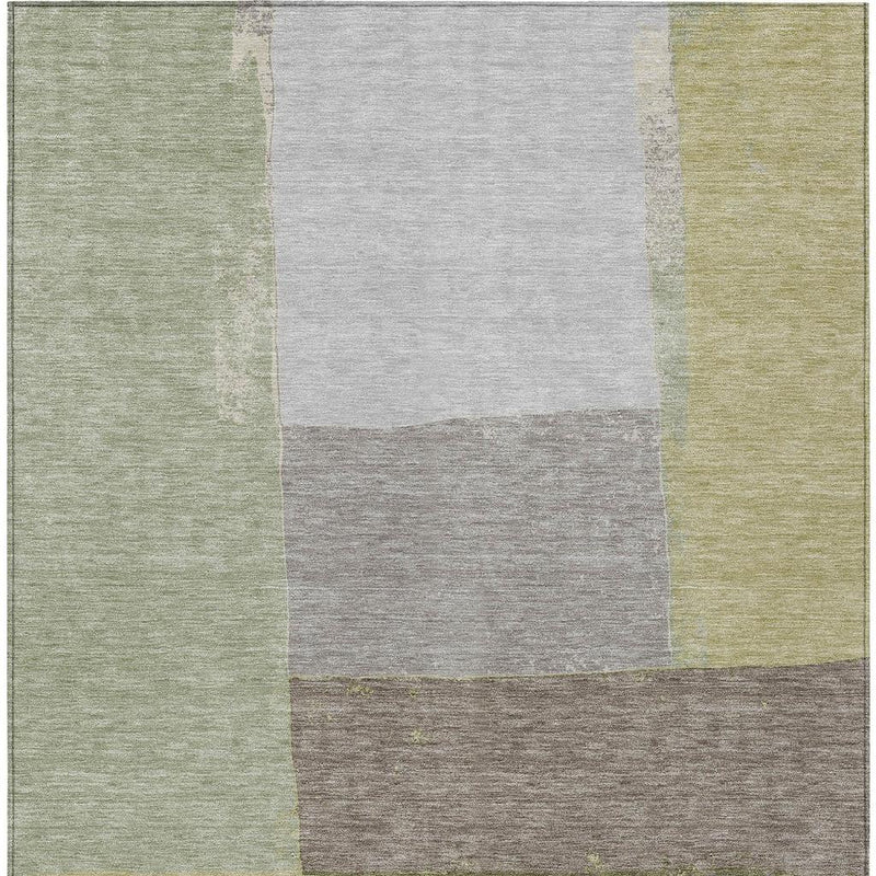 Geometric wash area rug with stacked blocks in light gray, off-white, and green tones
