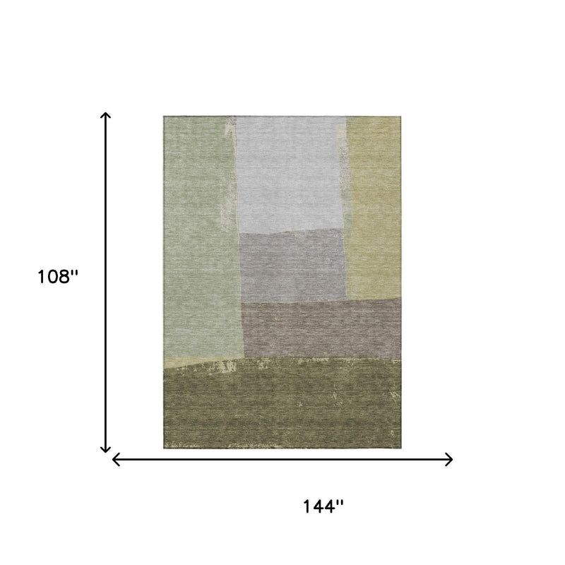 Geometric wash area rug, olive and fern green blocks; size shown as 9 ft x 12 ft