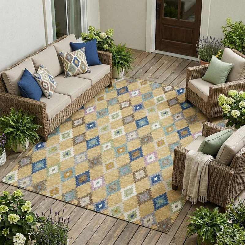 Aztec area rug in living room, gold ground with teal blue and multicolor diamond pattern