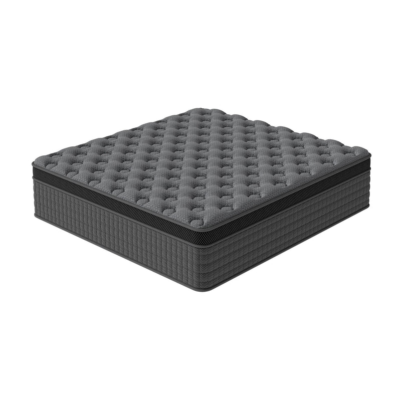 Dark gray hybrid mattress with tufted surface and structured edge border