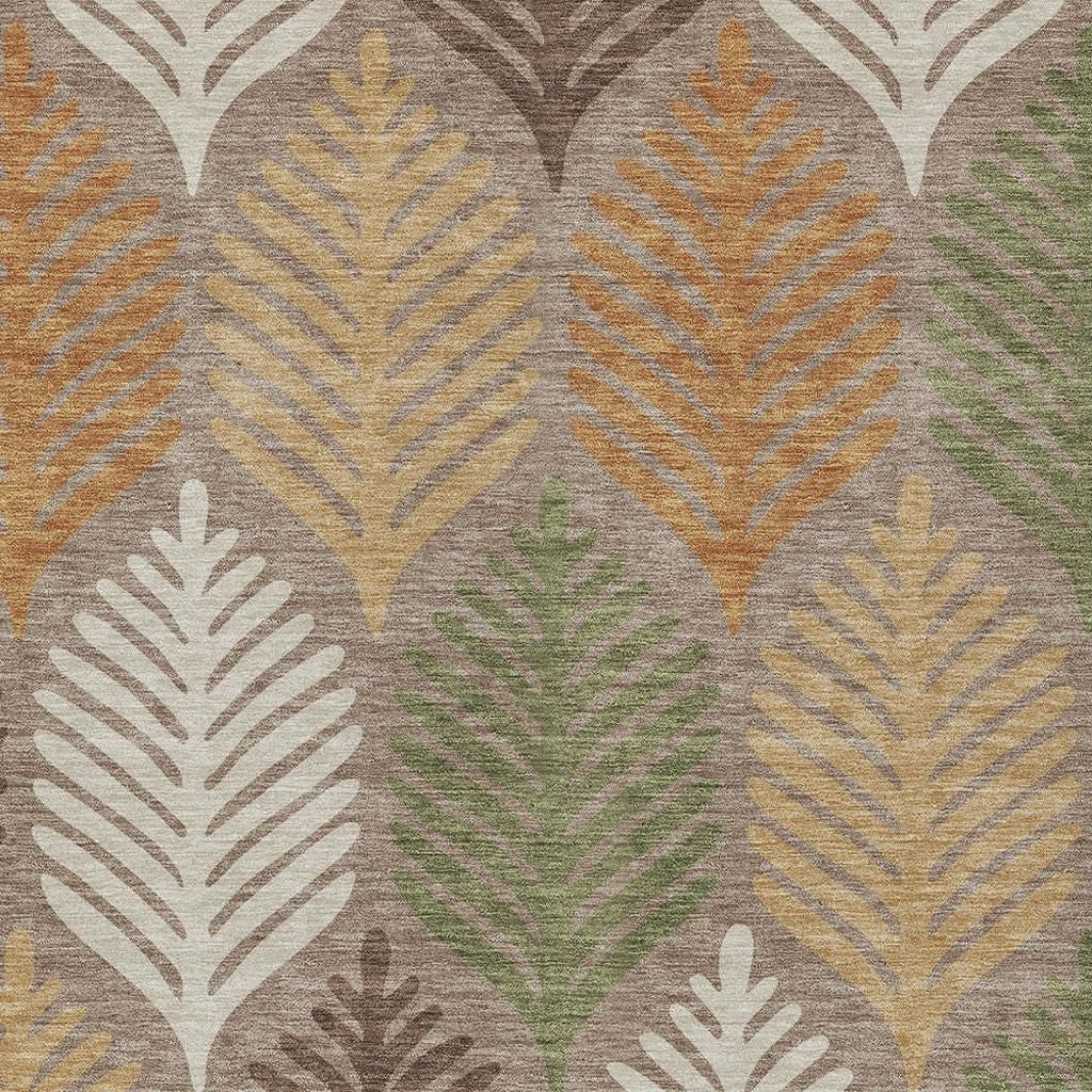 Leaf-pattern area rug texture with taupe background and beige, orange, green details