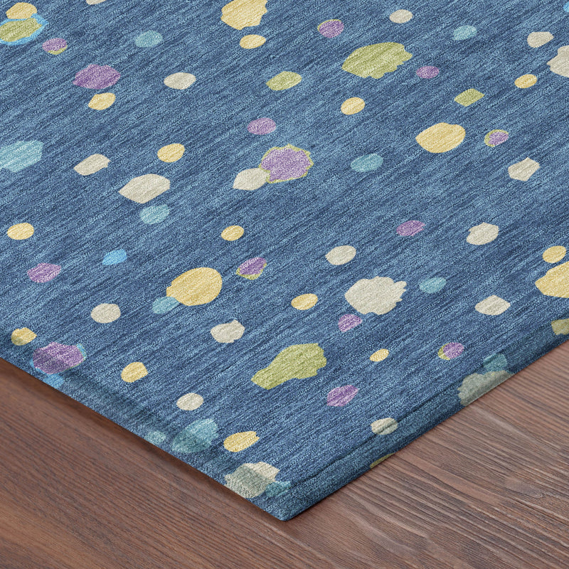 Navy indoor outdoor area rug corner with scattered multicolor heart and dot pattern