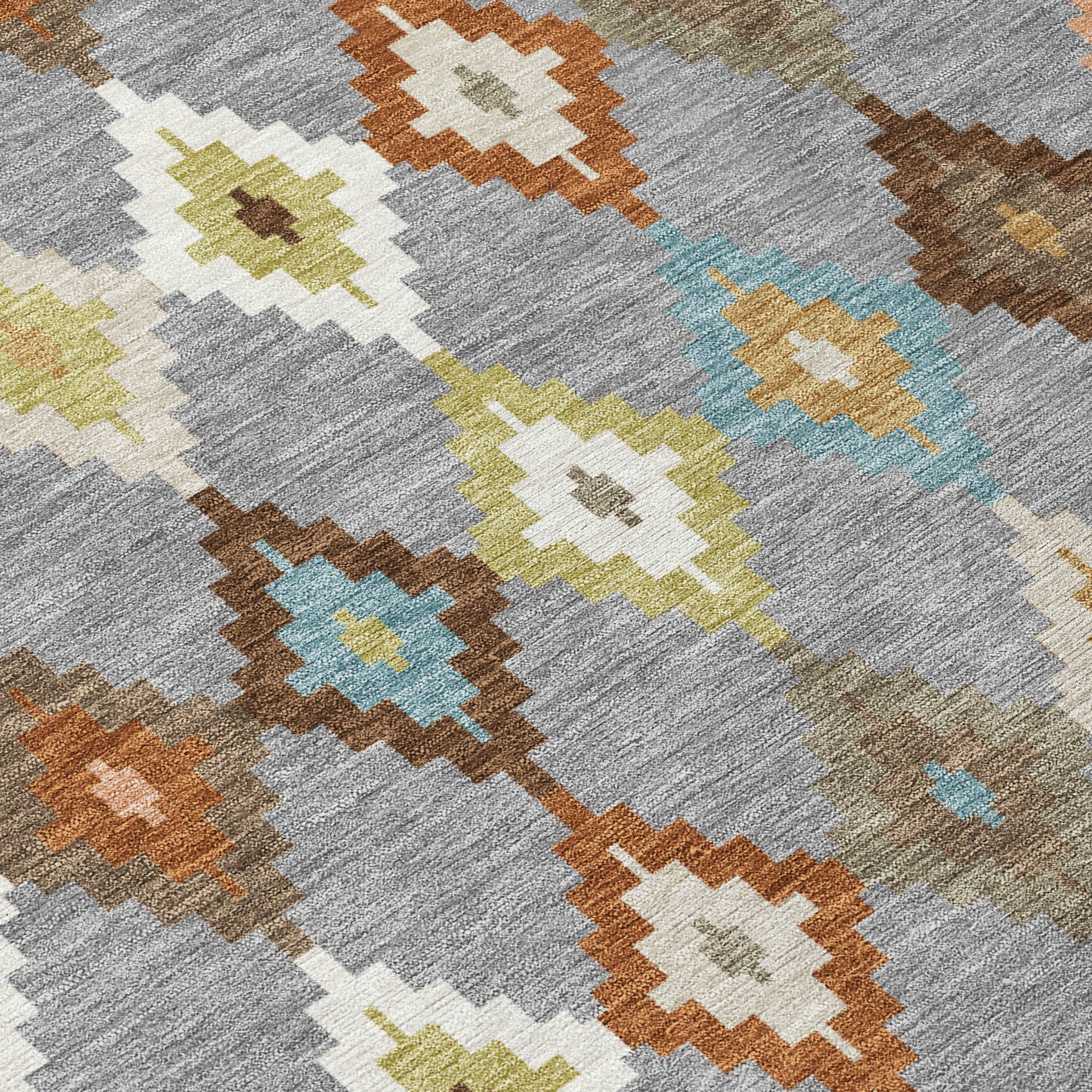 Round area rug with grey ground and multicolor Aztec diamond pattern border.