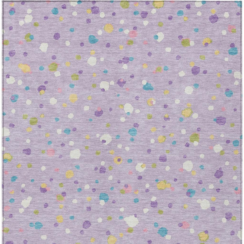Lavender geometric area rug with scattered multicolor and ivory speckled pattern, centered