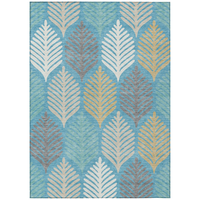 Teal blue area rug with ivory and gold leaf pattern, top view.