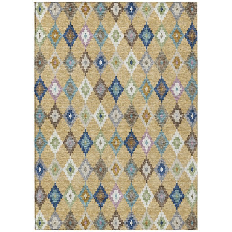 Indoor outdoor area rug with repeating diamond and cross motifs in gold, teal blue, and ivory