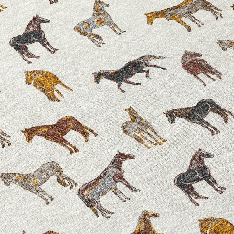 Ivory area rug with detailed horse silhouettes in brown, black, and gold tones