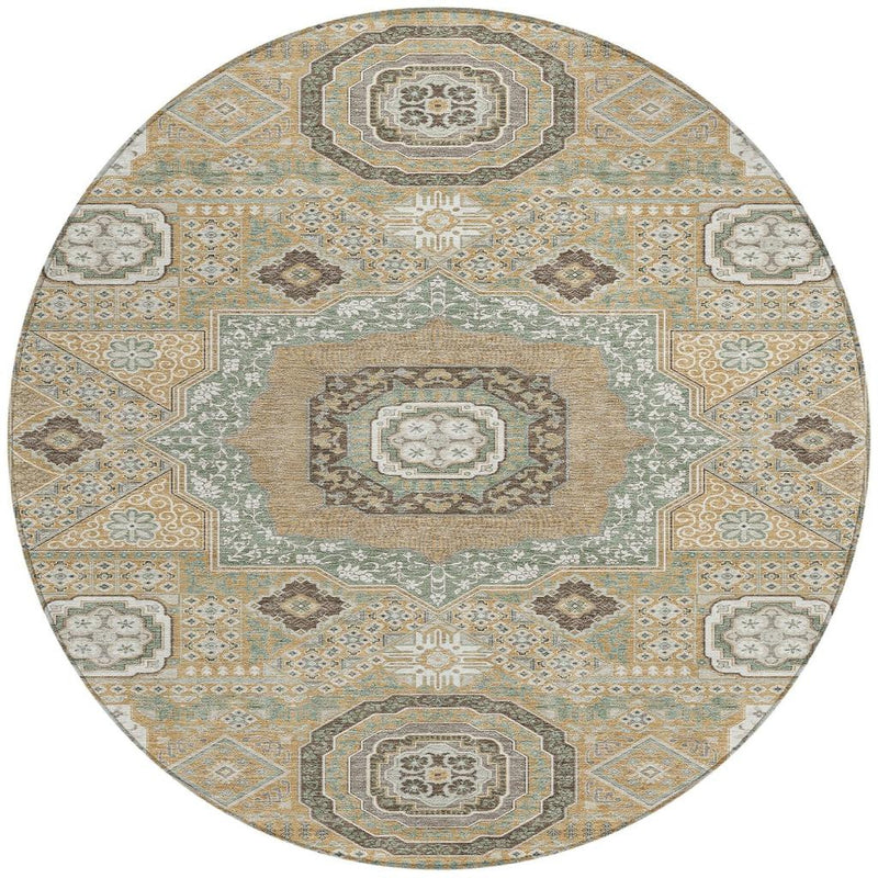 Round oriental area rug in gold, sage, and ivory with centered layered medallion