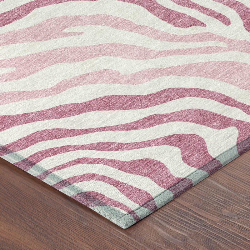 Pink and ivory zebra stripe indoor outdoor area rug with flat woven texture
