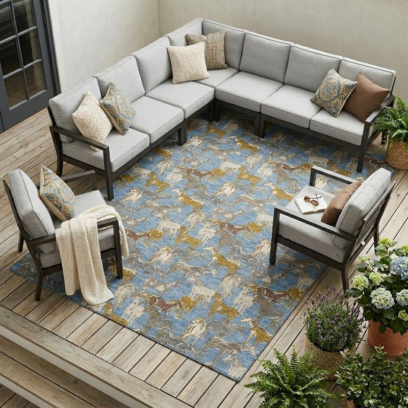 Blue horse-pattern rug under outdoor seating; beige and gold silhouettes across the surface.