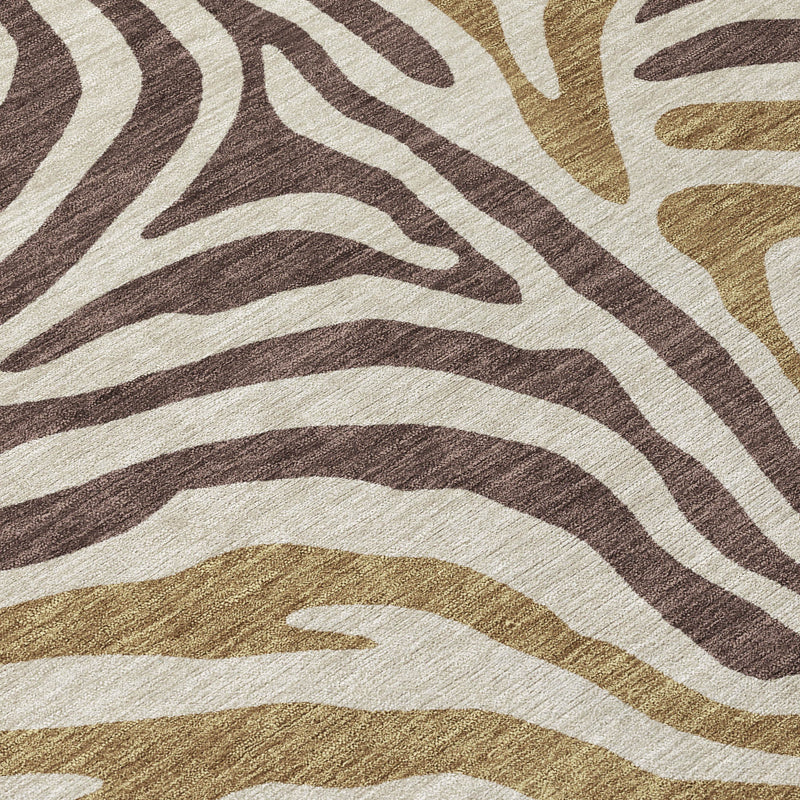 Close-up zebra stripe area rug with cream base and brown/tan wavy lines