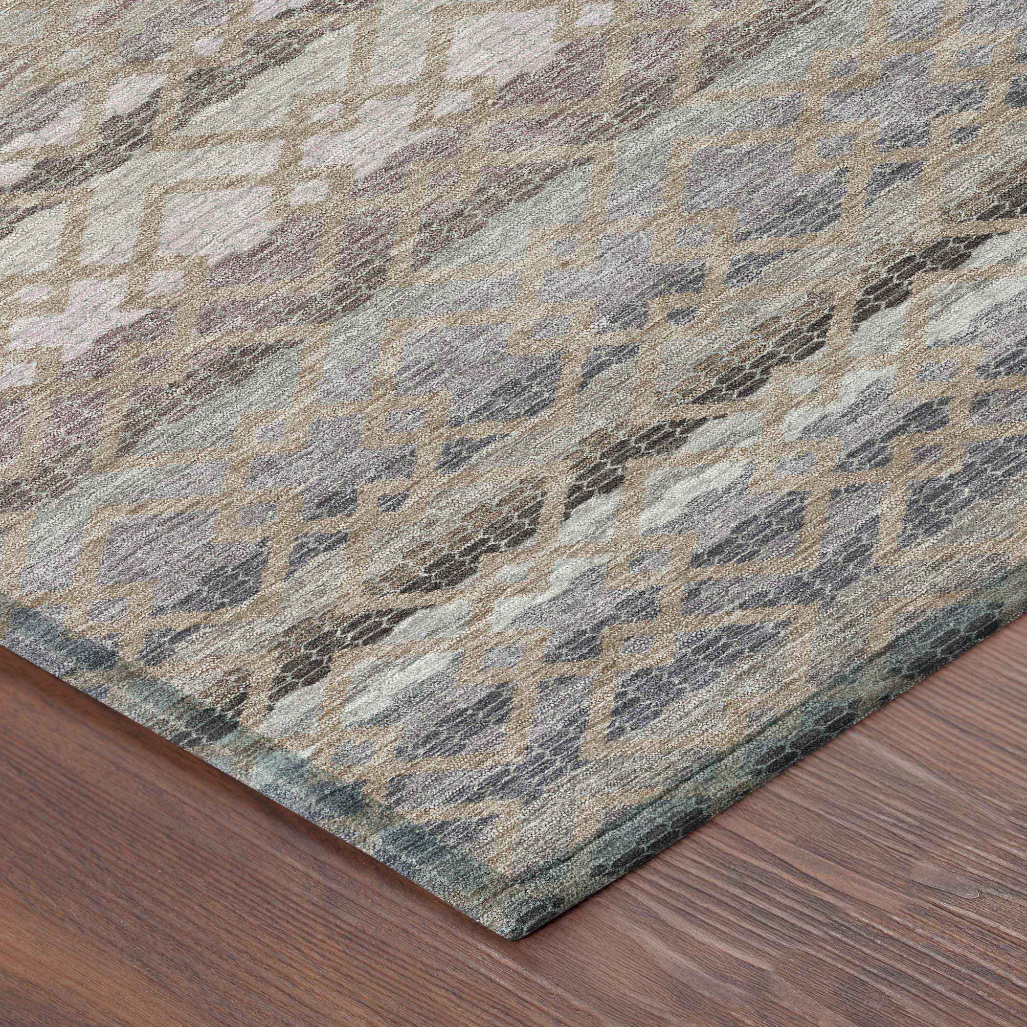 Multicolored geometric patterned area rug in gray, green, and beige, made of soft, durable fibers, ideal for modern decor.