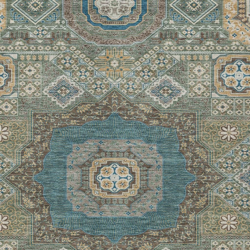Close-up teal-framed center medallion oriental area rug in blue, gold, and beige