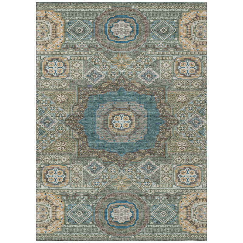 Oriental area rug with teal center medallion and repeating green, blue, and tan tiles