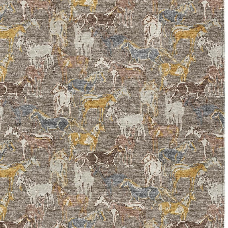 Horse-pattern area rug close-up with distressed texture in gray, taupe, blue, and gold