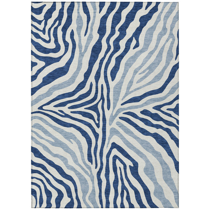 Rectangular zebra print area rug with navy, light blue, and ivory pattern