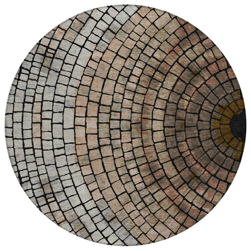 Round concentric brick-pattern area rug in beige, taupe, and dark gray on white