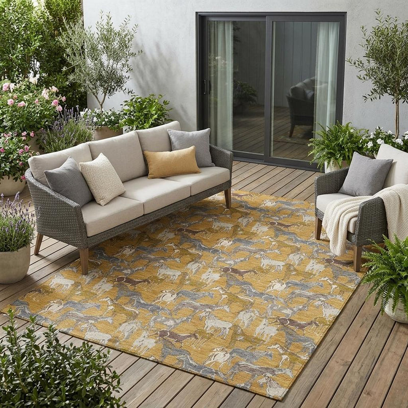 Horse print outdoor area rug in gold and beige with gray accents in a patio setting