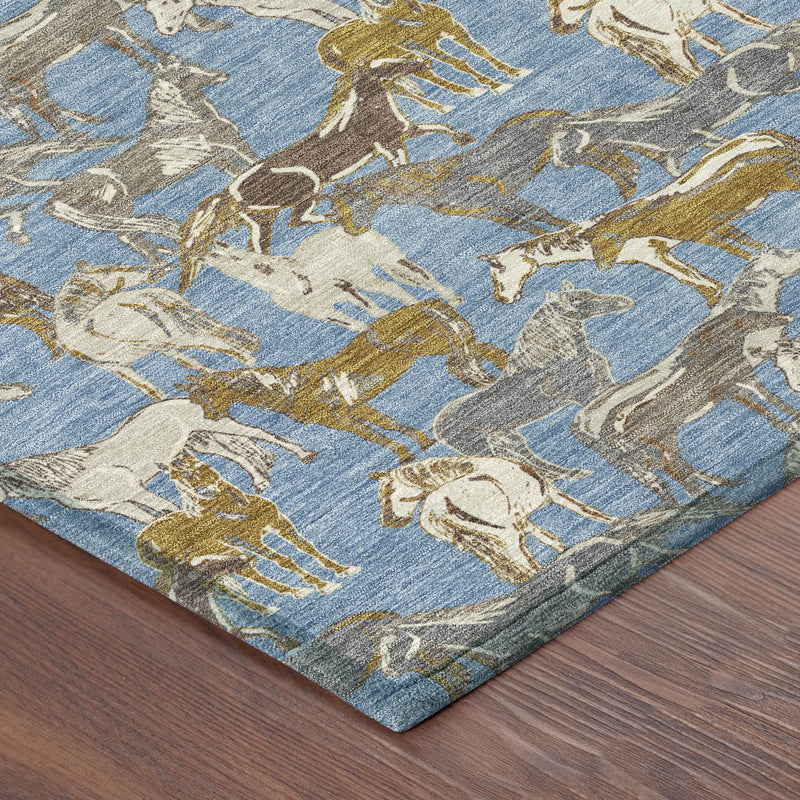 Corner of horse-pattern area rug with blue ground and beige and gold detail