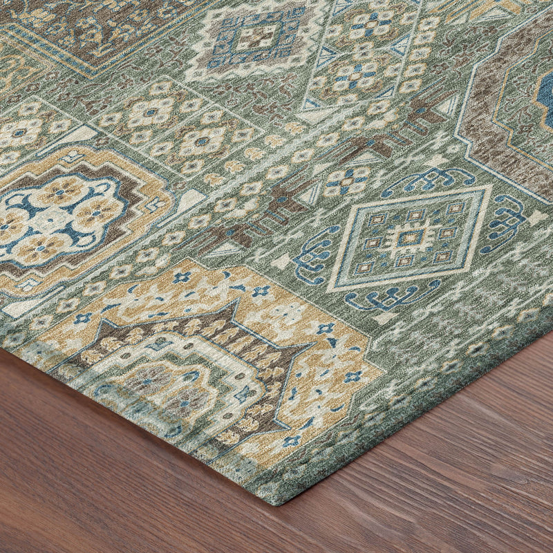 Round area rug corner with teal blue, green, and beige geometric pattern.