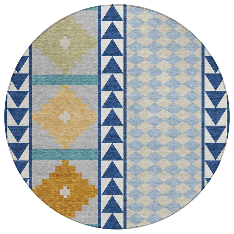 Round southwestern area rug with vertical navy border, blue diamonds, and tan cross blocks