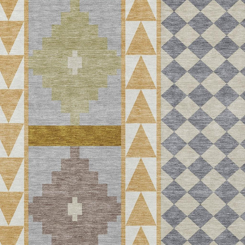 Close-up area rug with layered medallion shapes and diamond check accents in muted tones