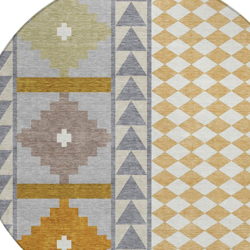 Round rug close-up with cross and chevron motifs in gray, beige, and mustard bands