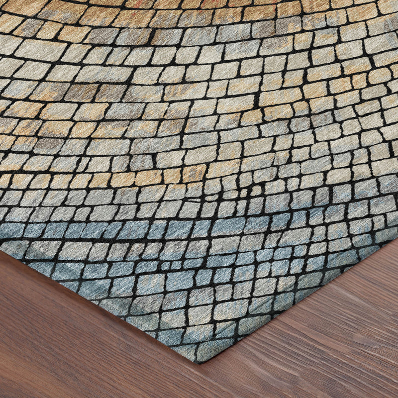 Corner view of geometric area rug with brick mosaic texture in blue, cream, and copper-orange