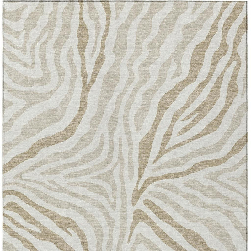 Close-up of ivory and beige zebra-print area rug with textured, flat surface