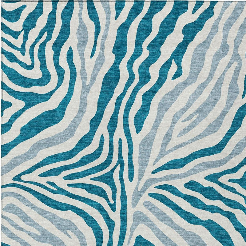 Teal blue and ivory zebra print area rug face, full pattern view