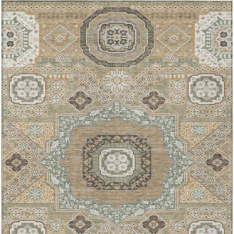 Area rug featuring central square medallion in sage and ivory with gold accents
