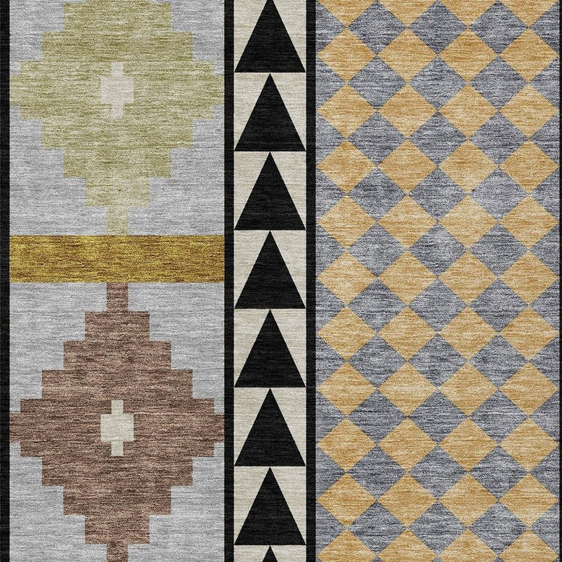 Area rug close-up showing gray and beige medallions and yellow diamond panel with black trim