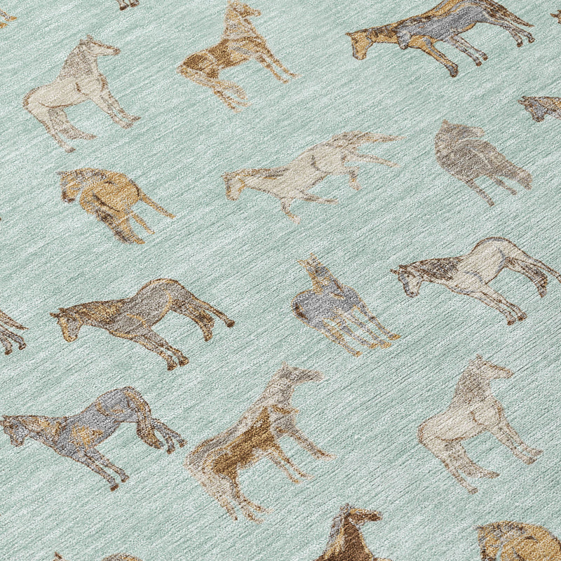 Close-up of mint green rug with beige horse print and textured surface