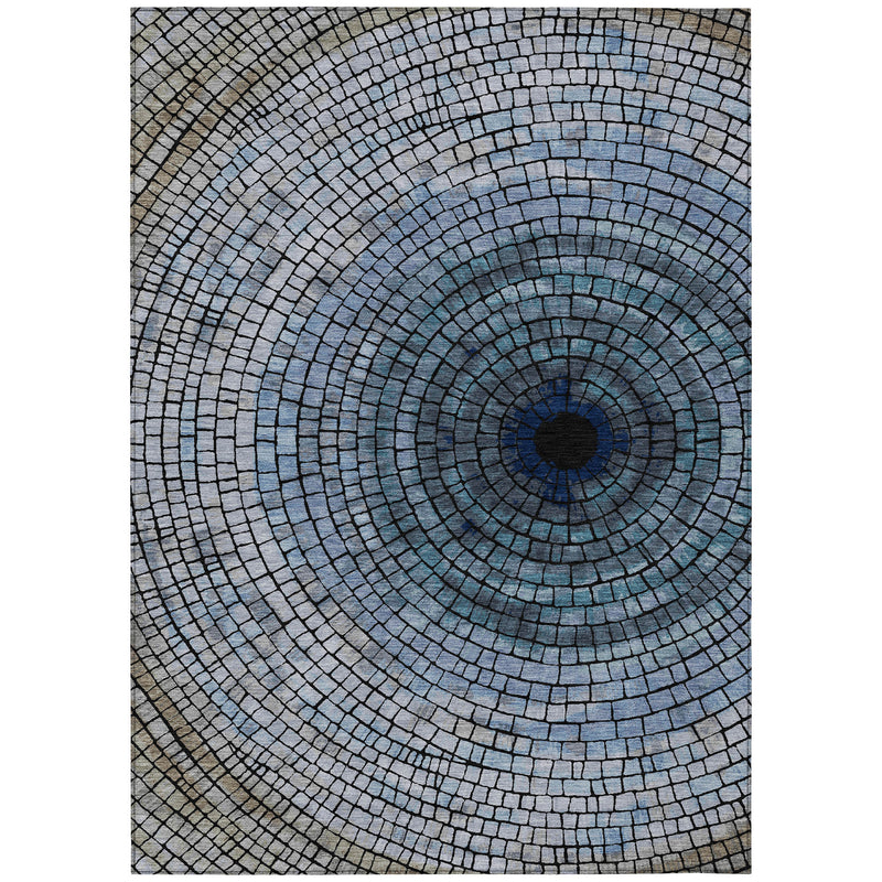 Denim blue geometric area rug with concentric brick mosaic rings and dark center