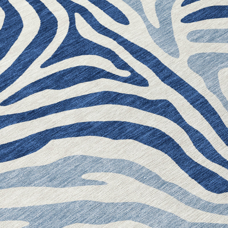 Navy and ivory zebra stripe area rug, close-up of textured wave pattern