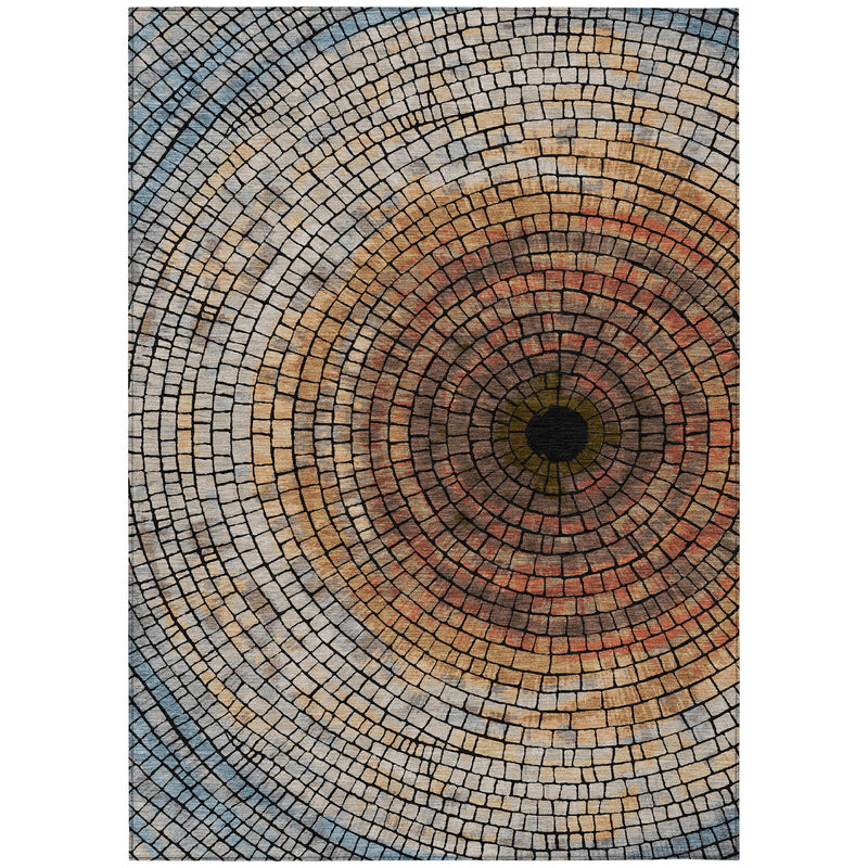Geometric area rug with concentric circle mosaic in blue-gray, copper, and orange