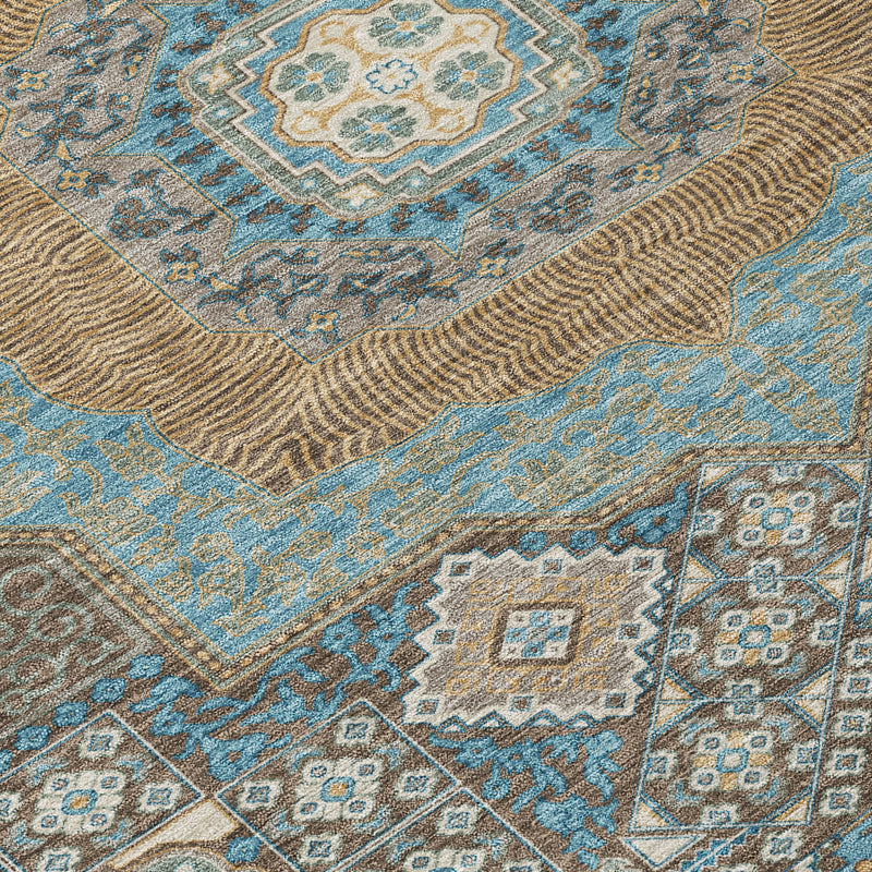 Close-up of blue and beige oriental area rug with woven stripe texture and medallion motifs