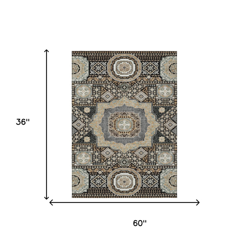 Rectangular Oriental area rug, black and ivory design with light blue accents, size 60" x 36"