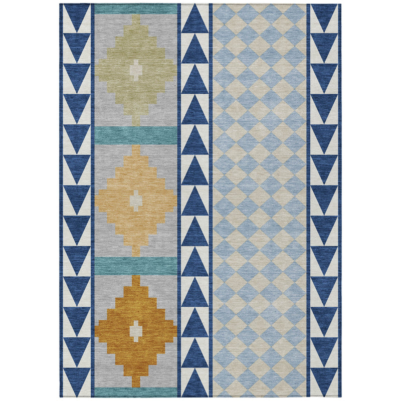 Geometric area rug with navy border, teal and gray sections, and tan motifs