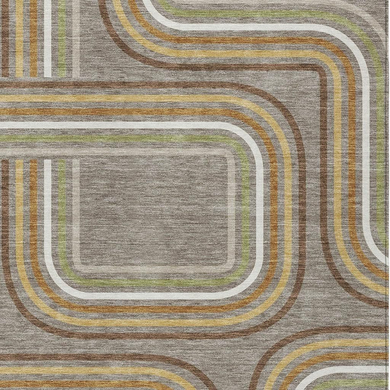 Taupe and ivory area rug corner with layered wavy geometric lines